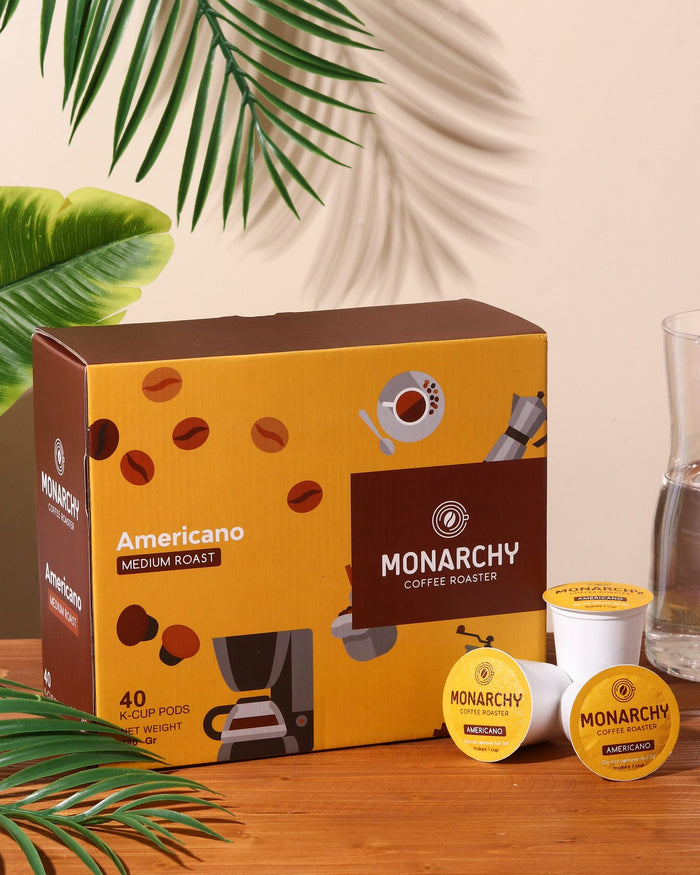 Boks kopi kapsul Americano Monarchy dengan kapsul